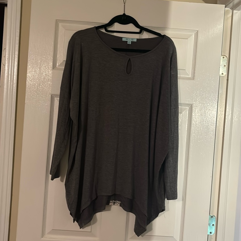 NWOT tags she and sky grey tunic with lace detailing on the back